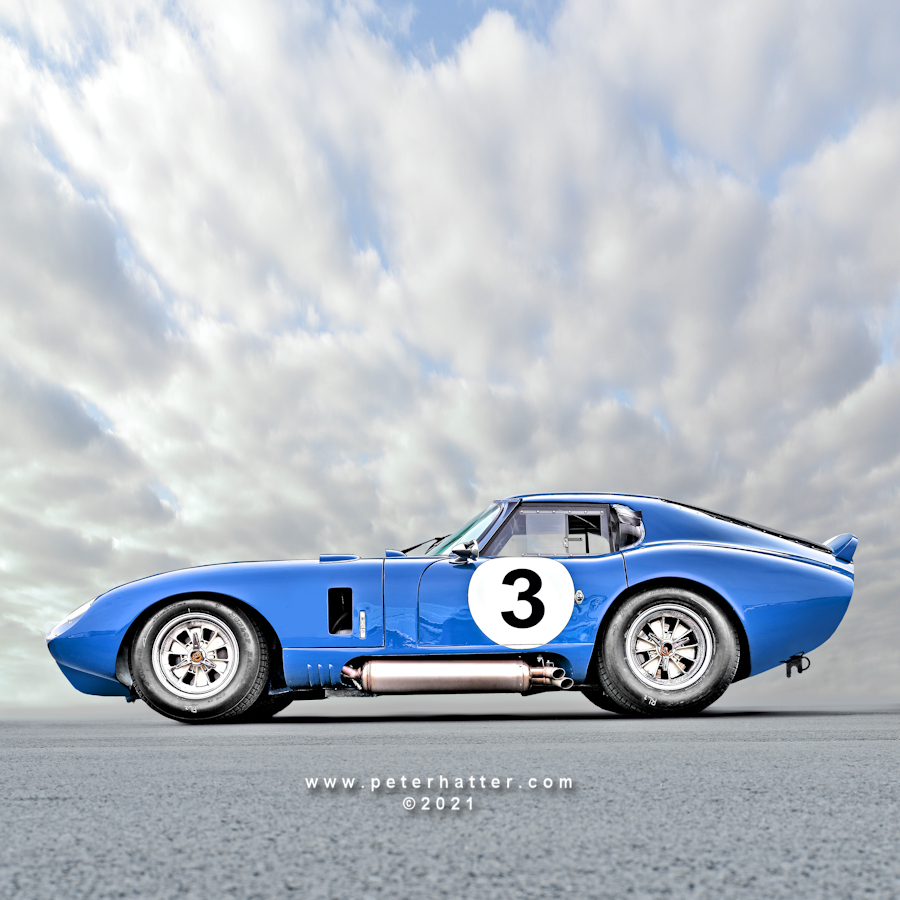 Portrait of a blue AC Cobra Daytona Coupe.